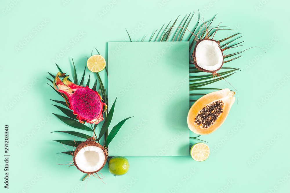 Summer composition. Tropical palm leaves, fruits, paper blank on mint green background. Summer concept. Flat lay, top view, copy space - obrazy, fototapety, plakaty 