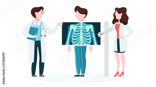 Doctor standing around a big x-ray image of chest