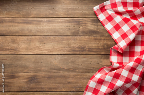 cloth napkin on at rustic wooden plank