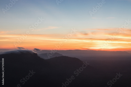 The sunrise view with mist on the mountian at Pha Mor E Dang, Khao Phra Wihan National Park, Thailand. © kannapon