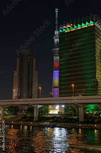 TOKYO, JAPAN, May 11, 2019 : Sumida river banks by night. The Greater Tokyo Area ranked as the most populous metropolitan area in the world.