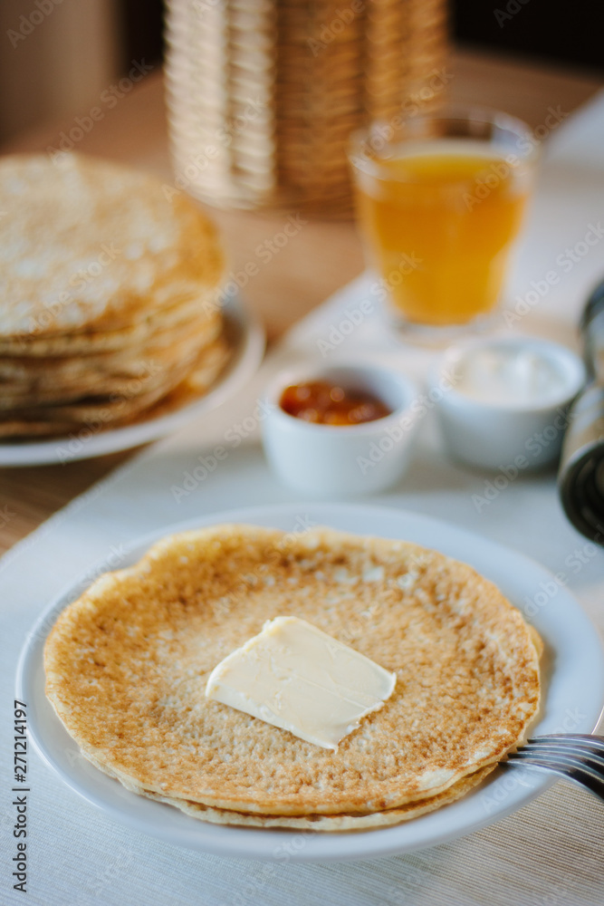 Russian pancakes with the butter on a restaurant. Russian pancakes with the butter on a restaurant.