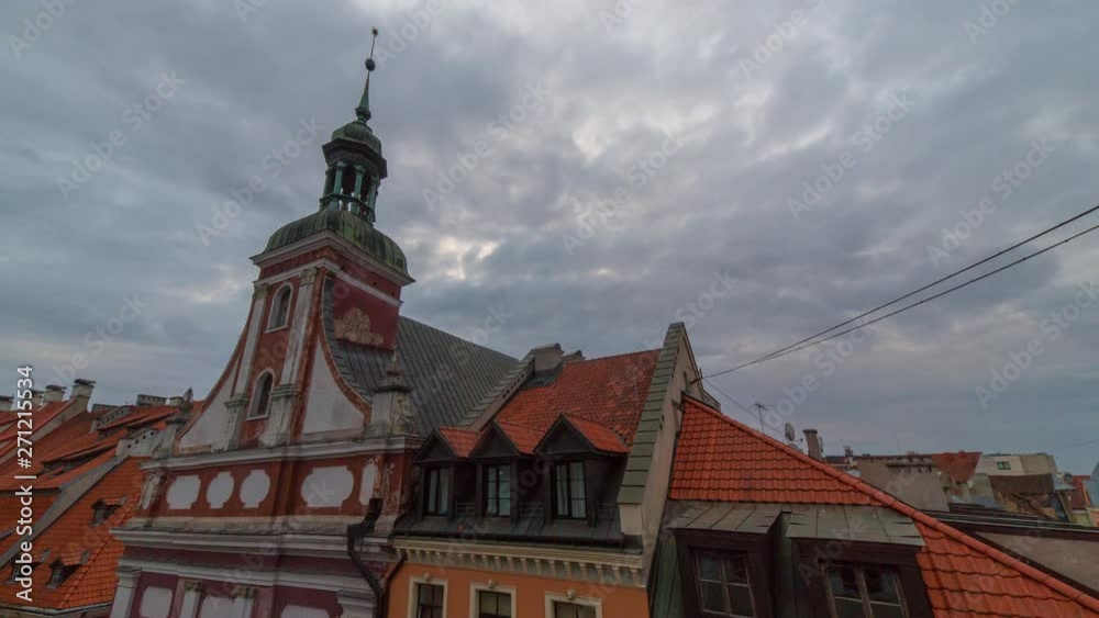 Time-lapse of moving clouds over an old building roof chimney in Riga Latvia