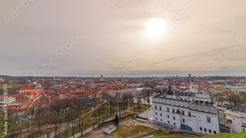 Time-lapse during golden hour with moving clouds over Vilnius Lithuania photo