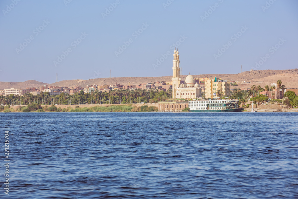 Passing Aswan by boat, navigating on the Nile