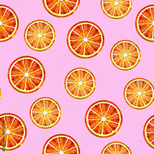 Seamless pink background with slices of orange and grapefruit