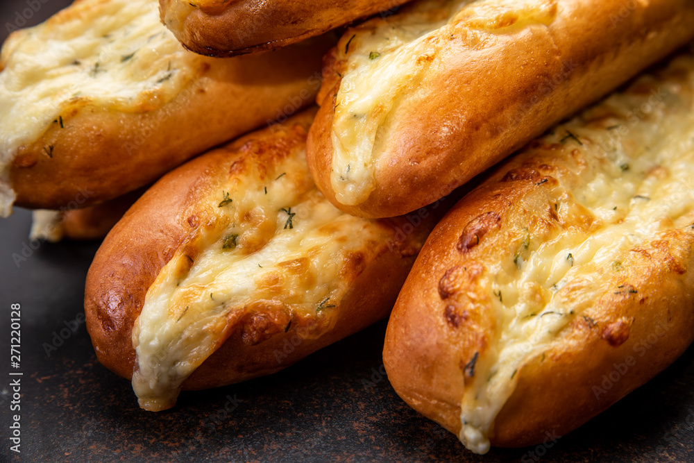 Assortment of fresh French baguettes on a wooden table