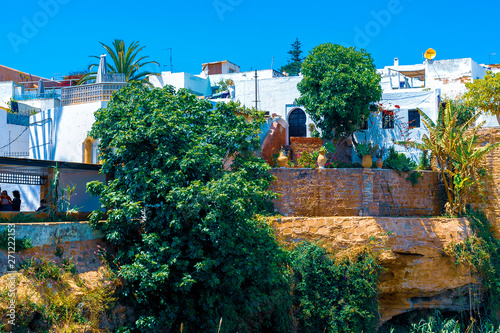 Medieval walls and white houses of Kasbah of the Udayas at the Bou Regreg river on a sunny day. Rabat, Morocco.