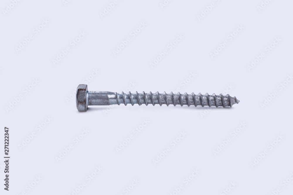 Silver screw isolated on white background. Metal screw nail, horizontal image. Tool for repair. Silver screw isolated on white background. Metal screw nail, horizontal image. Tool for repair.