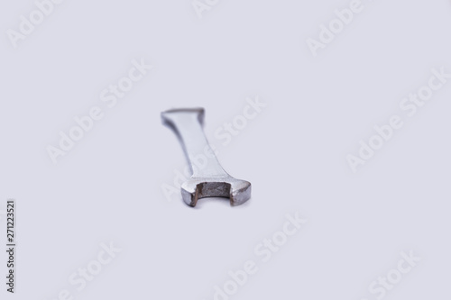 Steel wrench, front view. Plumber tool isolated on white background.