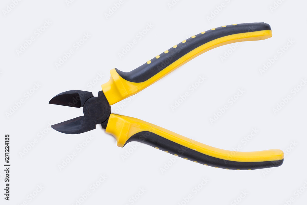 Obraz premium Pliers with rubber handle on white background. Tool for electrician or repairman. Sale of instrument for repair.