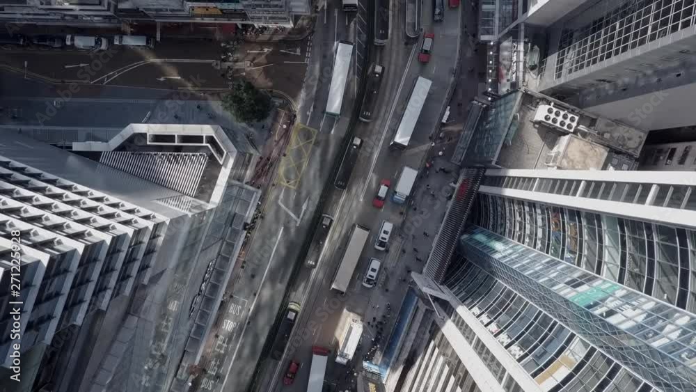 Slow Motion: Drone Shot Follows Bend in Busy Hong Kong Street - Hong Kong, China Slow Motion: Drone Shot Follows Bend in Busy Hong Kong Street - Hong Kong, China