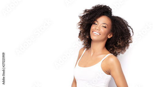 Young afro girl posing in s...