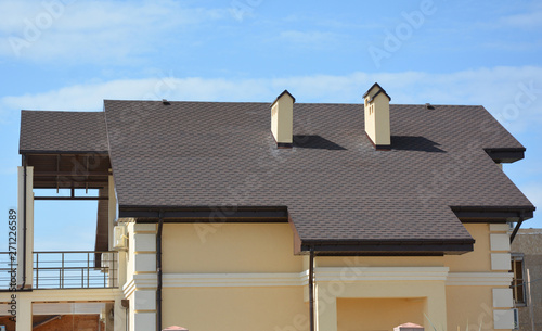 House asphalt shinges rooftop details photo