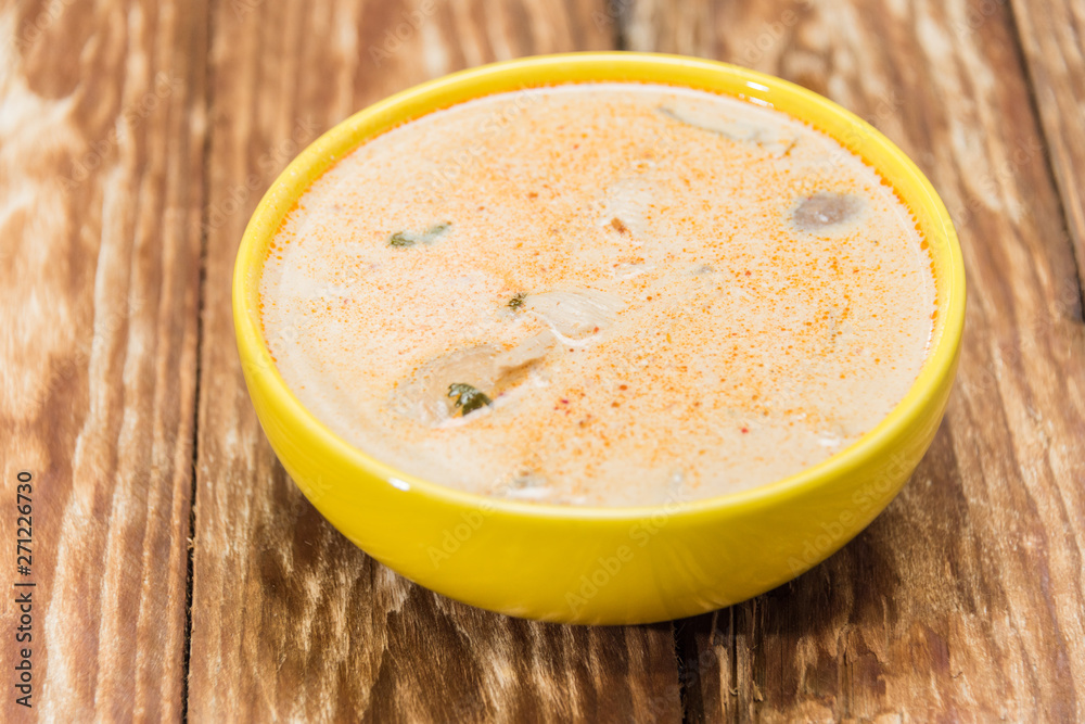 Beautiful yellow soup dishes with fresh vegetables. Buffet of Assorted of Chinese Food Dishes Beautiful yellow soup dishes with fresh vegetables. Buffet of Assorted of Chinese Food Dishes