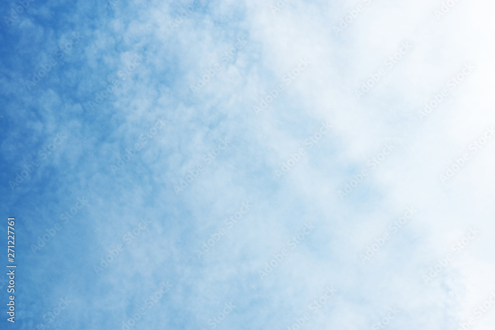 Beautiful light blue sky with white clouds