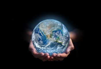 earth in hands. green planet on hand. save of earth. environment concept for background web or world guardian organization.Elements of this image furnished by NASA