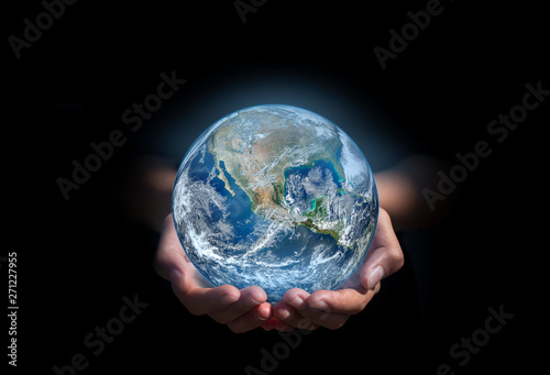 earth in hands. green planet on hand. save of earth. environment concept for background web or world guardian organization.Elements of this image furnished by NASA #271227955