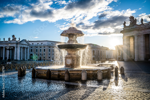 St. Peter's Square by night and a fountain