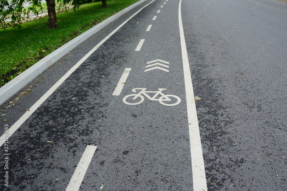 asphalt bicycle track with a bicycle marking asphalt bicycle track with a bicycle marking