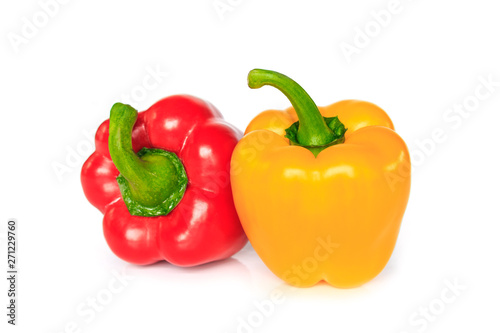 red and yellow bell pepper on white background.