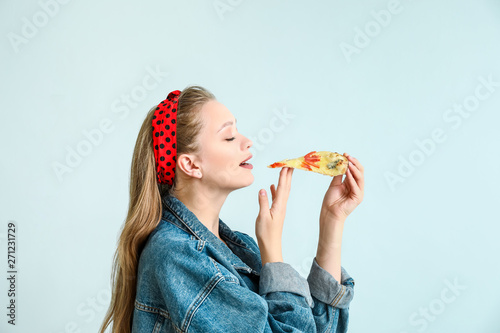 Beautiful woman eating tast...