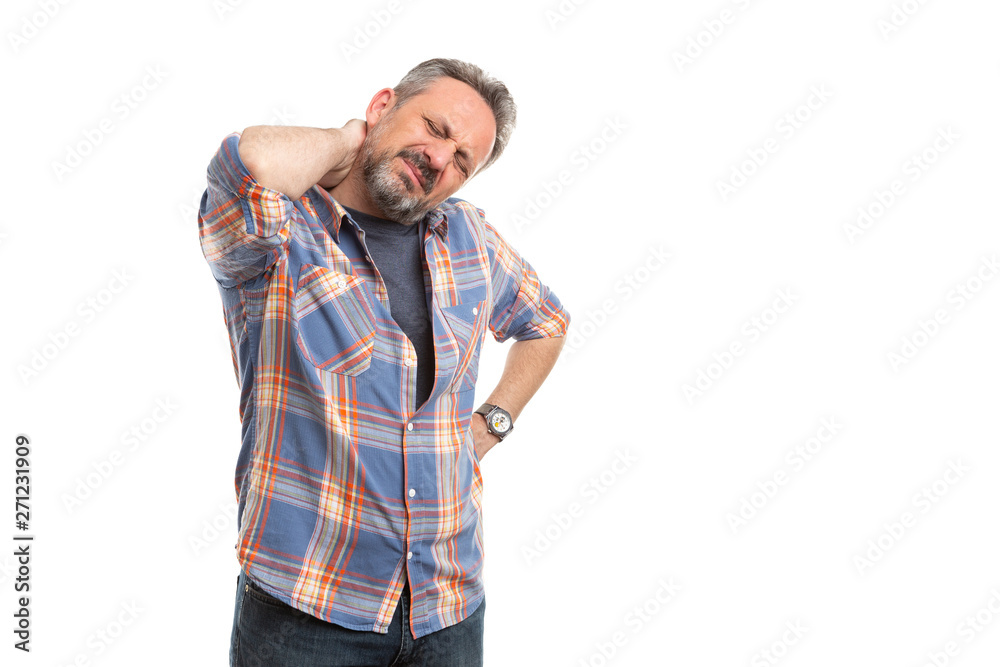 Man touching painful back of neck Man touching painful back of neck
