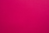 Magenta felt texture abstract art background. Colored fabric fibers surface. Empty space.