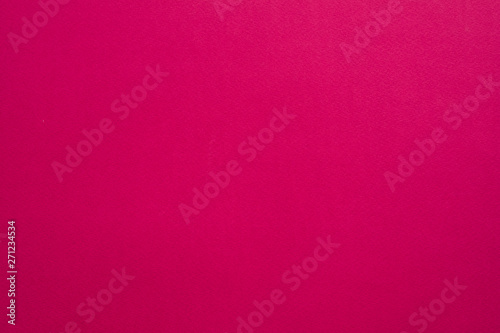 Magenta felt texture abstract art background. Colored fabric fibers surface. Empty space.