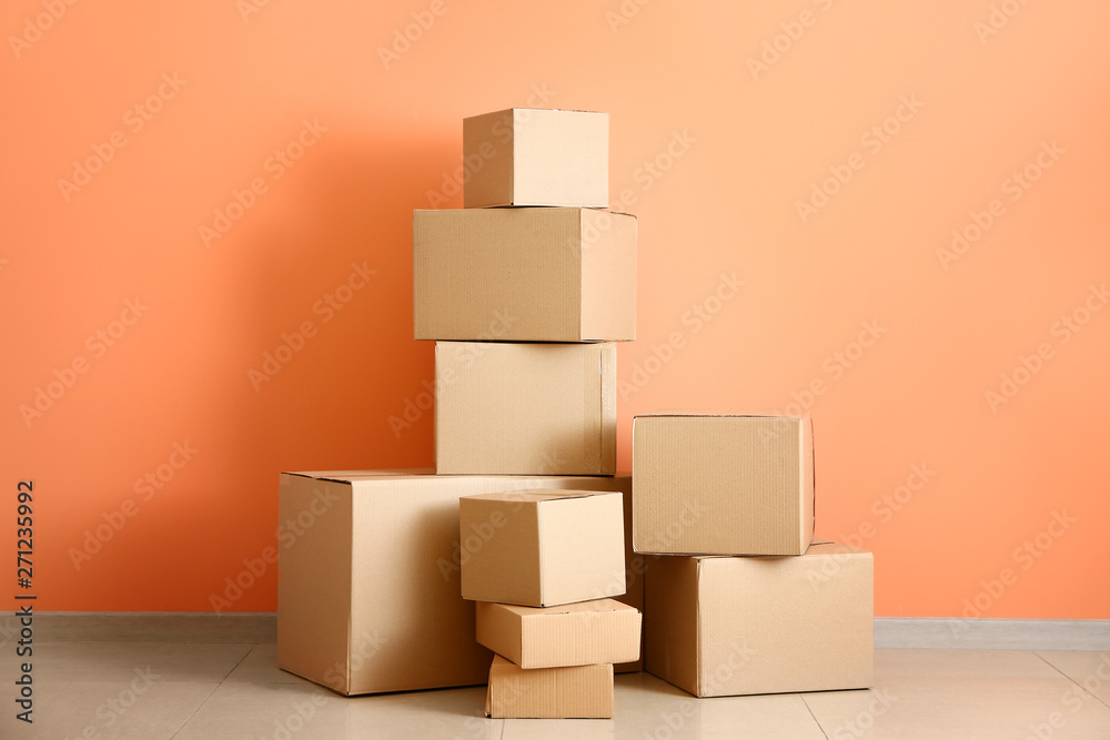 Cardboard boxes near color wall Cardboard boxes near color wall
