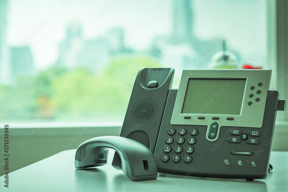 close up soft focus on ip phone devices at office desk close up soft focus on ip phone devices at office desk