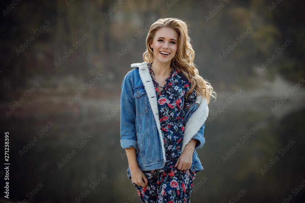 Outdoor fall portrait of girl with hat and jeans wear. Outdoor fall portrait of girl with hat and jeans wear.