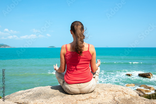 Young woman practice yoga outdoors