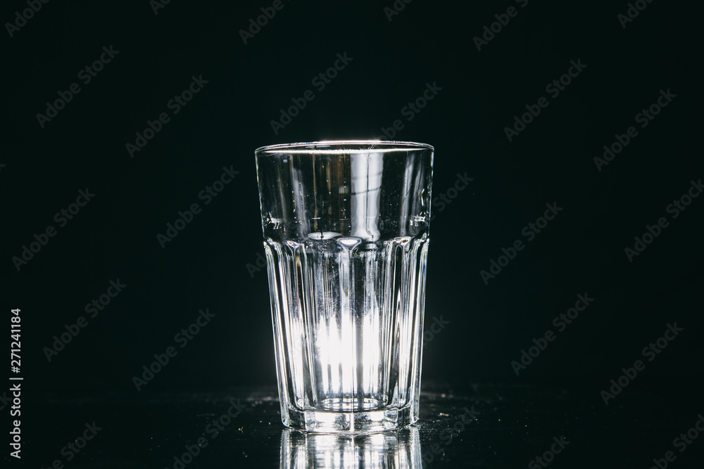 Empty glass on black background Empty glass on black background