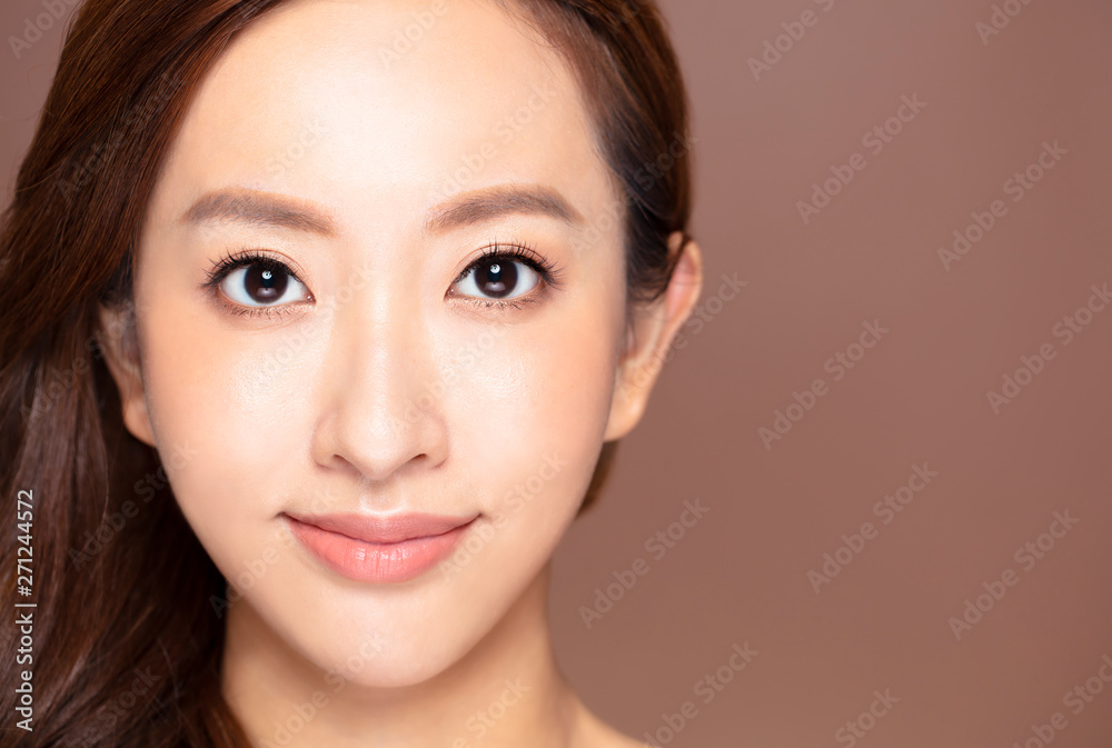 Obraz premium closeup young woman face with makeup and clean skin