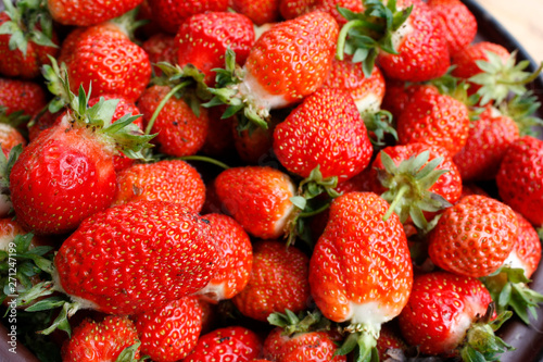 Strawberry. Macro of fresh organic red berries. Fruit background. Close-up.