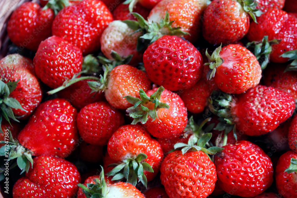 Strawberry. Macro of fresh organic red berries. Fruit background. Close-up. Strawberry. Macro of fresh organic red berries. Fruit background. Close-up.