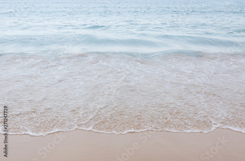 Wave of the sea on the sand beach