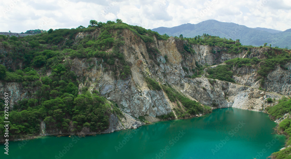 Landscape nature scenic of Grand Canyon Chonburi with blue sky is old rock mining at Chonburi of Thailand Landscape nature scenic of Grand Canyon Chonburi with blue sky is old rock mining at Chonburi of Thailand