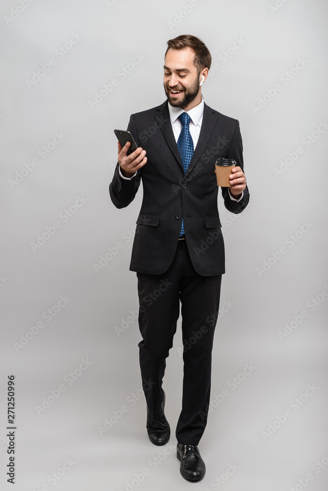 Full length of an attractive smiling young businessman Full length of an attractive smiling young businessman