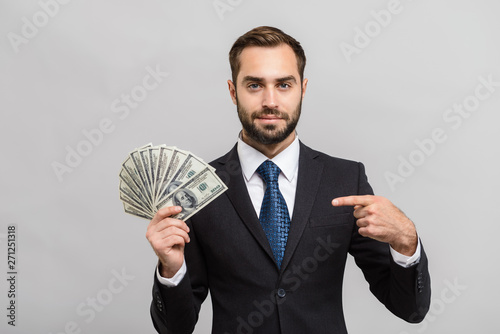 Attractive young businessman wearing suit