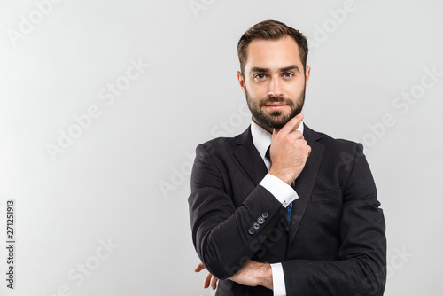 Attractive young businessman wearing suit