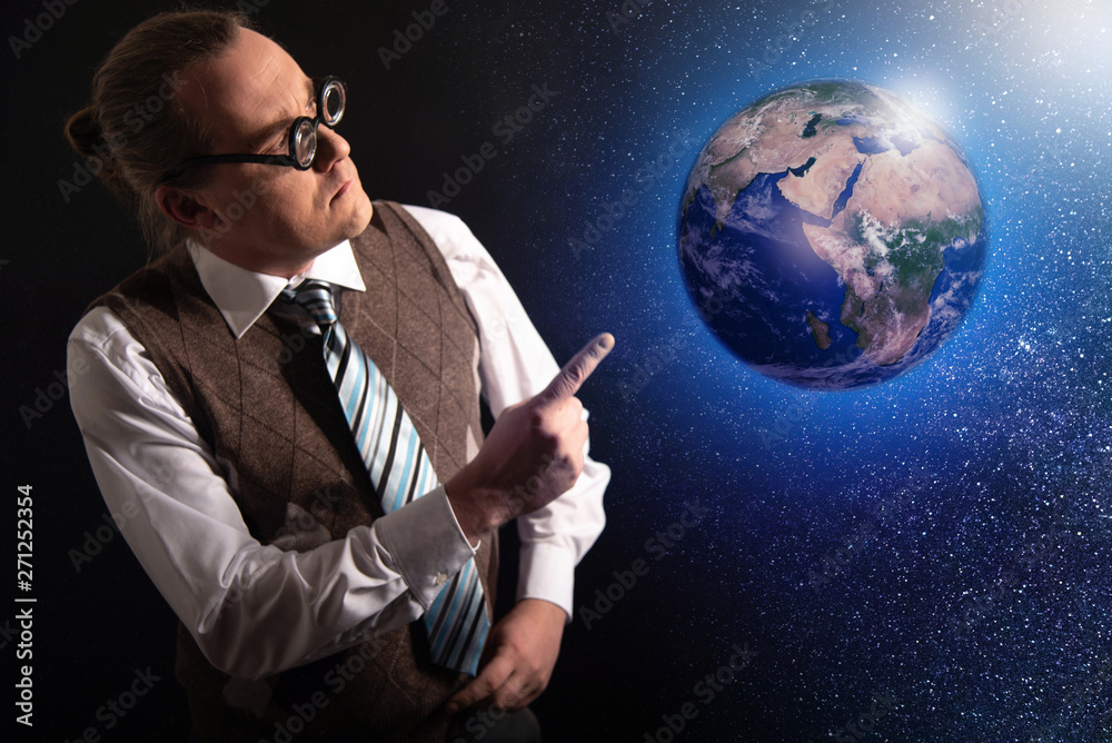 Funny scientist looking to universe and planet earth Funny scientist looking to universe and planet earth