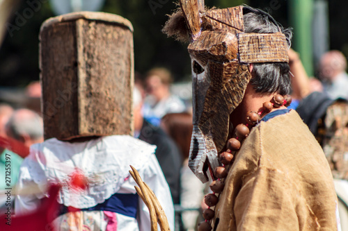Masked man at Iberian Mask International Festival in Lisbon photo