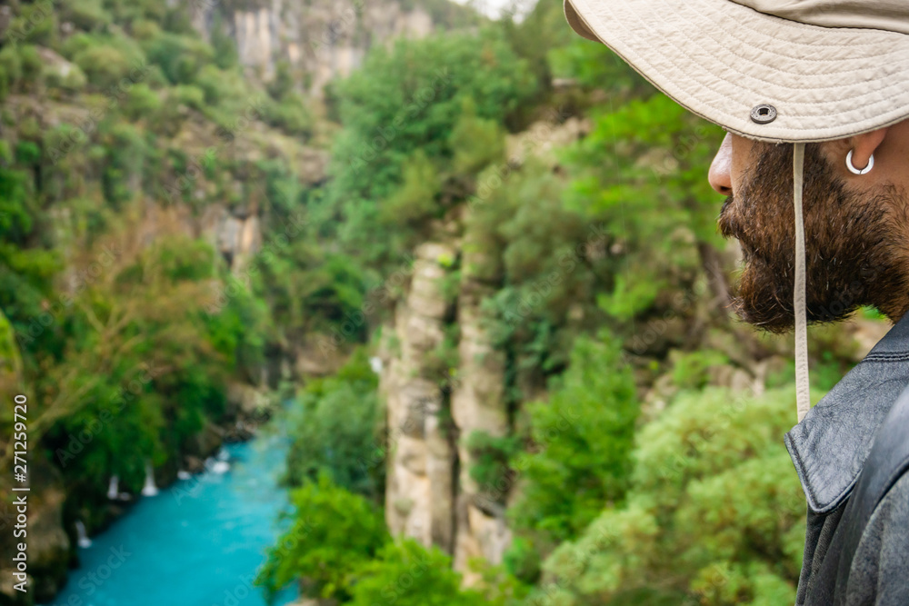 Amazing river landscape from Koprulu Canyon in Manavgat, Antalya, Turkey. A man watching the river.