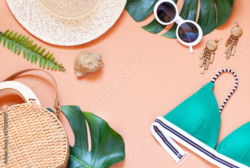 Fashion vacation concept tropical summer flat lay. Top view. Copy space photo