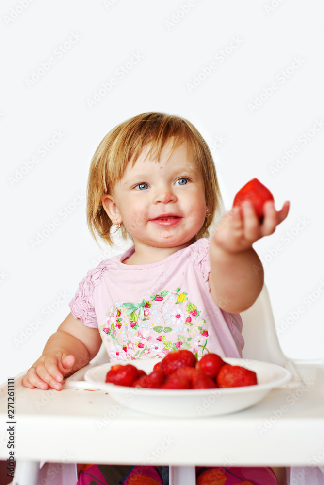 baby girl eating strawberry baby girl eating strawberry