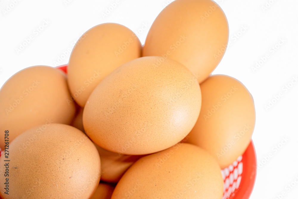 eggs isolated on white background on red basket eggs isolated on white background on red basket
