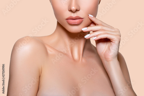 Photo Beauty. Closeup Model lips beige in Studio. - image.