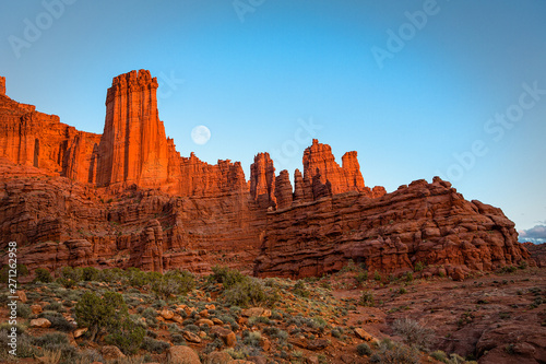 Moon rise at sunset on Fisher Towers near Moab, Utah.